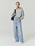 woman wearing vintage wash 100% cotton denim jeans with relaxed straight leg and low rise fit