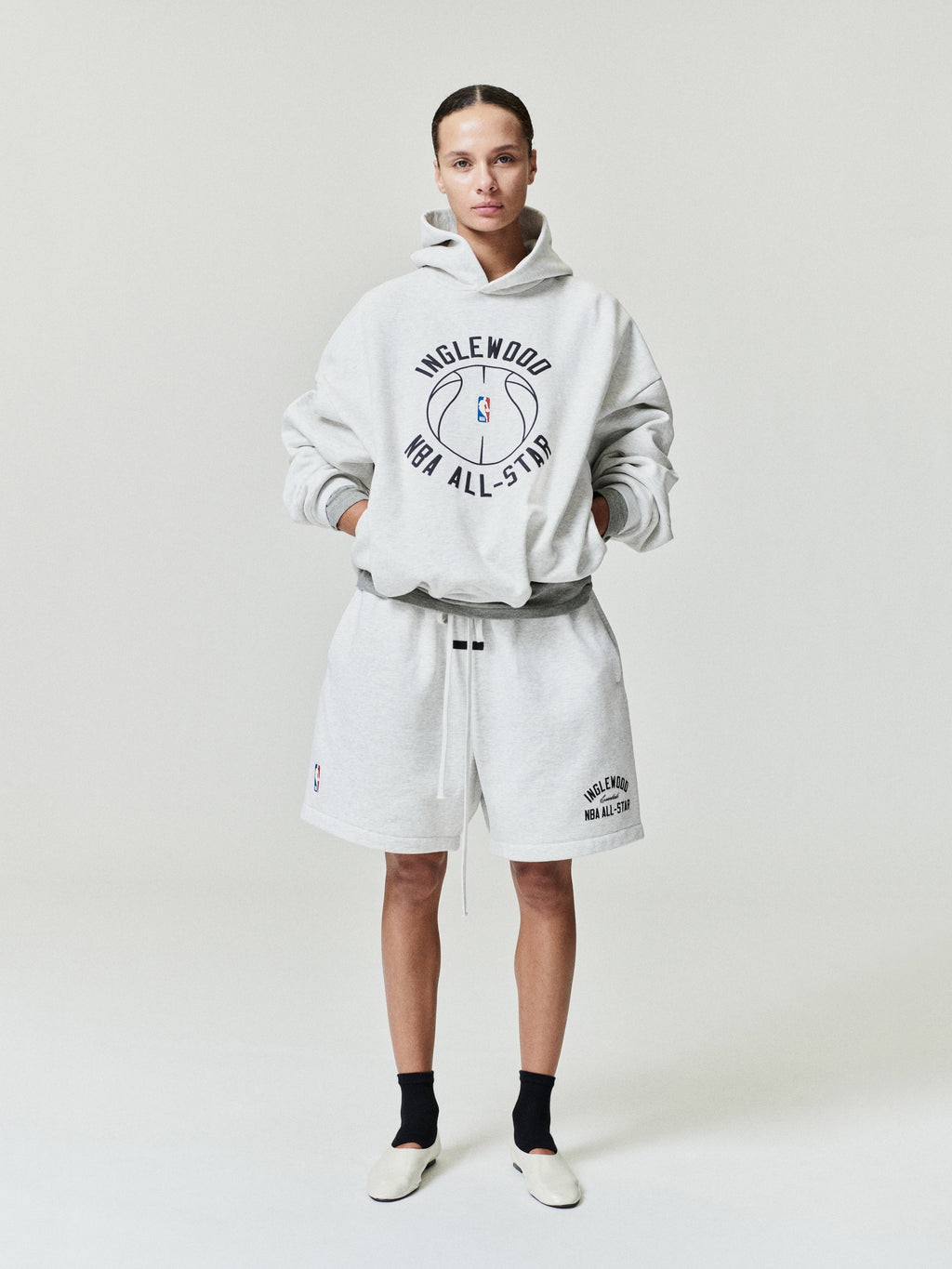 light grey heavyweight cotton fleece sweatshorts with relaxed fit, adjustable drawstrings, and NBA All-Star logo on leg