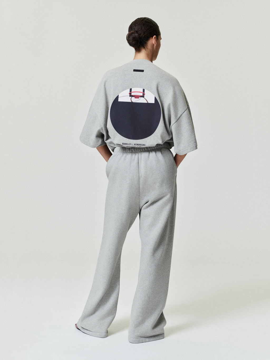 light grey oversized heavy cotton jersey tee with circular basketball hoop graphic and Barkley Hendricks text on back