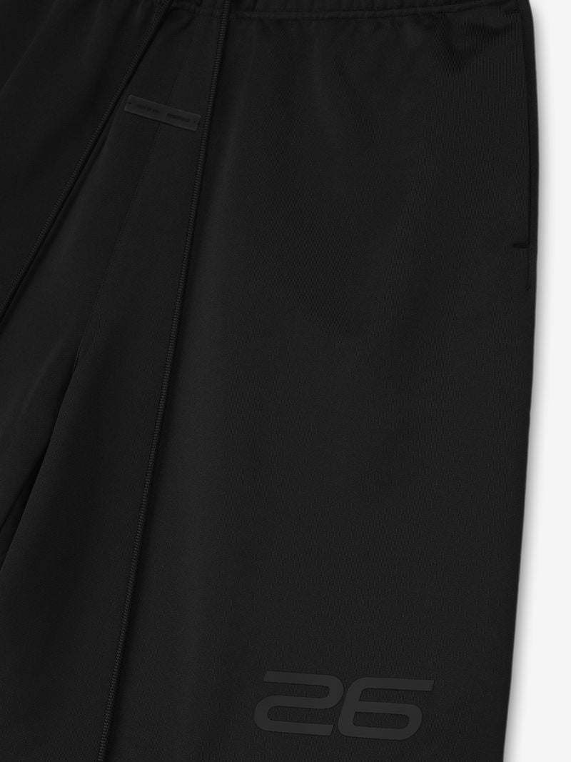 Close-up of black Satin Fleece Relaxed Sweatshort showing smooth fabric texture and subtle tonal "26" print near hem
