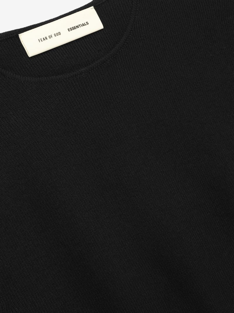 Close-up of neckline and textured fabric of black womens rib long sleeve dress with Fear of God Essentials label cgJt7fCg.jpg gallery 0