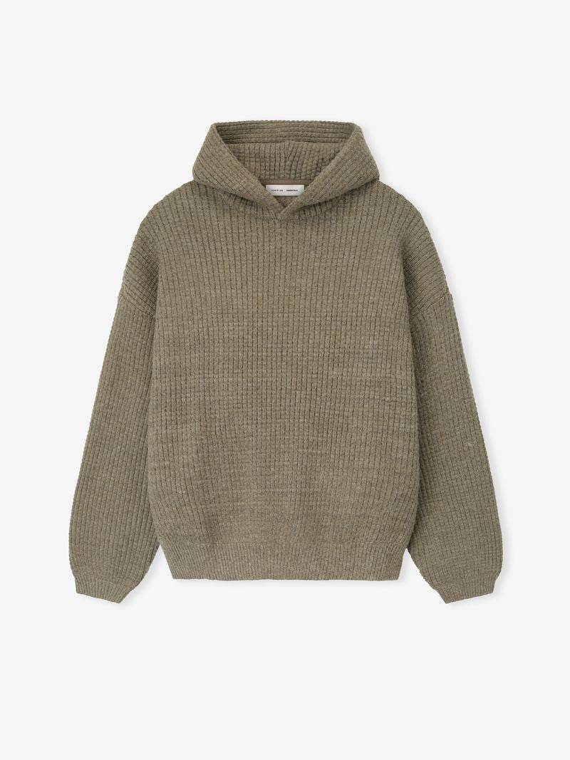 Front flat lay of olive green Heavy Waffle 90s Hoodie showing knit texture and attached hood on plain background