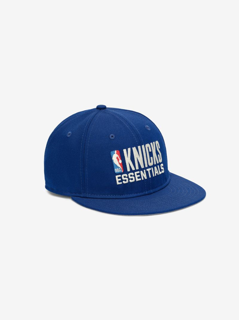 Front side view of blue Knicks 9Fifty RC Snapback displaying NBA and Knicks Essentials embroidered logos jMZORgYg.jpg