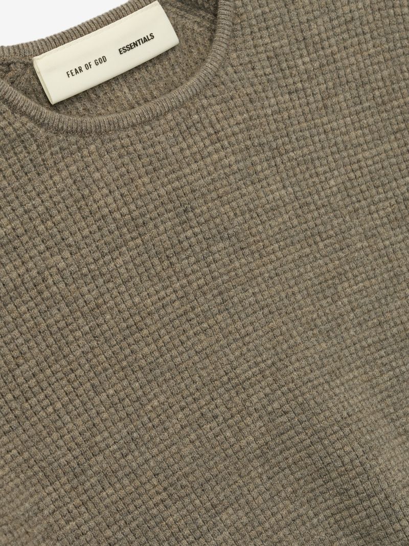 Close-up of taupe womens waffle knit long sleeve top with Fear of God Essentials label sHhOZcWQ.jpg gallery 0