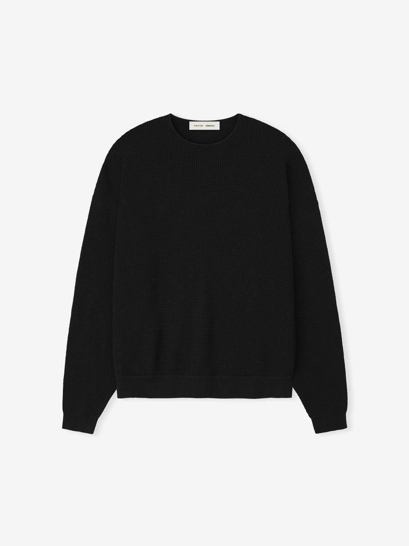 Flat lay of black Waffle Crewneck 90s Sweater with subtle texture and visible neckline label xuz2zVJw.jpg