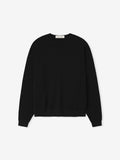 Flat lay of black Waffle Crewneck 90s Sweater with subtle texture and visible neckline label xuz2zVJw.jpg